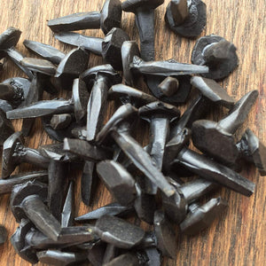 1 lb Box of 5/8" Steel Decorative Wrought Head Nails with Black Oxide Finish.